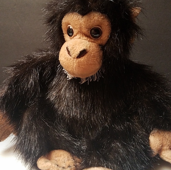lifelike chimpanzee stuffed animal